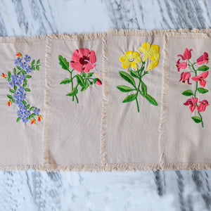 Tan Placemats with Hand-Embroidered Flowers - La Porte Bonheur